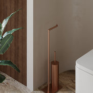 Matte black freestanding toilet paper holder with toilet brush